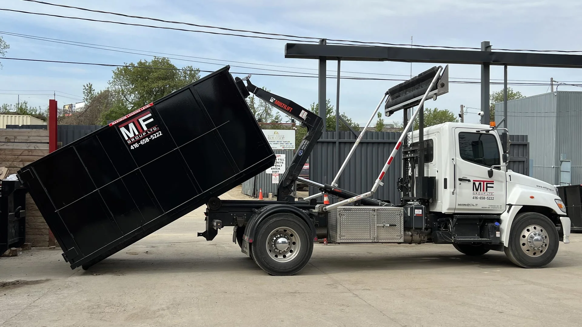 Garbage bin rental on residential driveway
