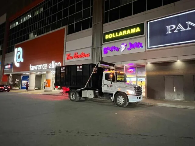 MTF Group truck with dumpster bin loaded