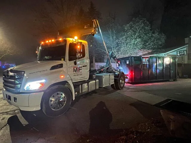 MTF Group truck on delivery route at night